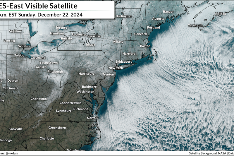 Cloud streets billow over the Atlantic behind a powerful cold front